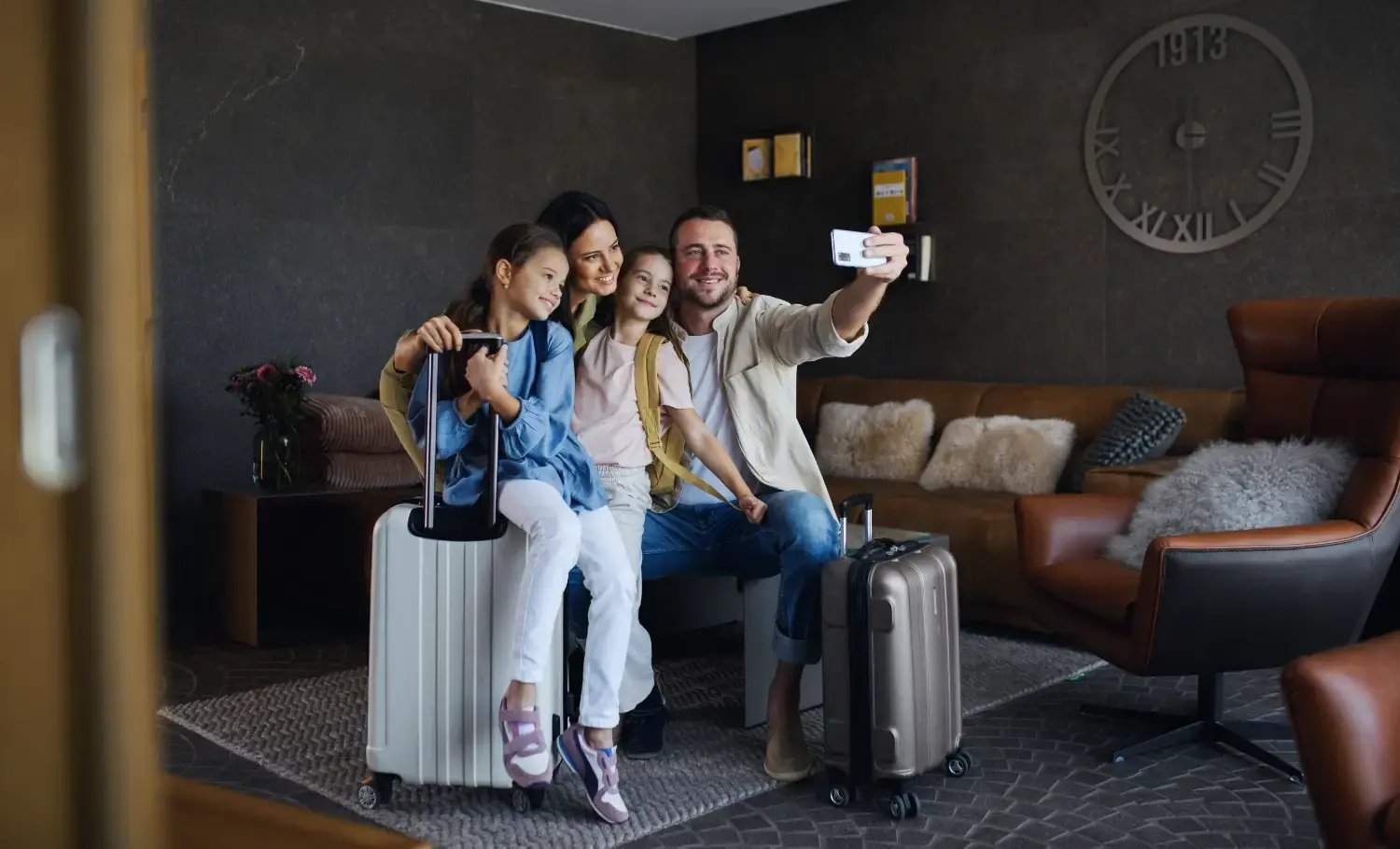 Photo of happy hotel guests enjoying their hotel experience.