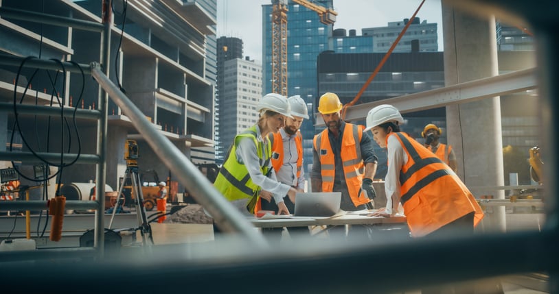 Workers having a meeting on a construction site