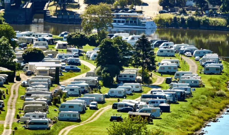 Aerial view of a site for caravans and mobile homes on the banks of the river Weser.